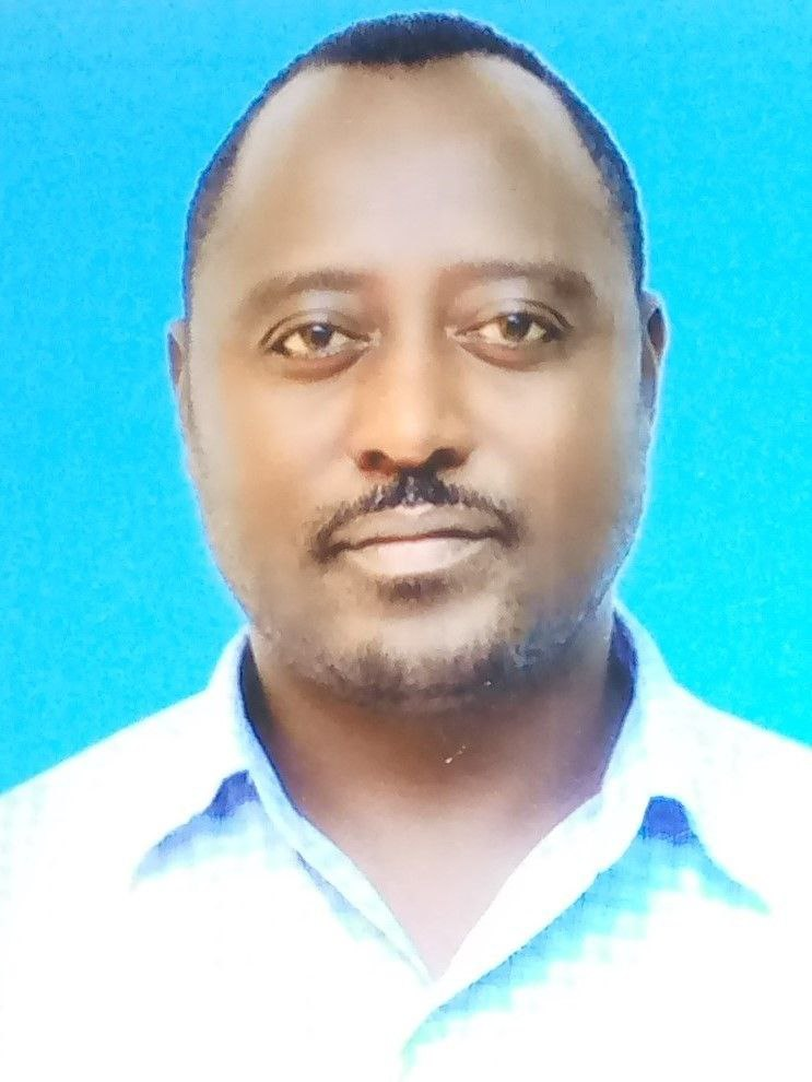 Dr.  Berako Belachew